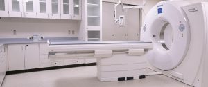 Seamless medical-grade commercial sheet vinyl flooring installed in a hospital CT scan radiology room by All Floors Commercial.